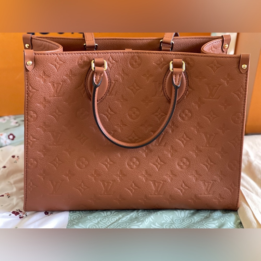 Louis Vuitton Cognac OTG MM Empreinte Leather